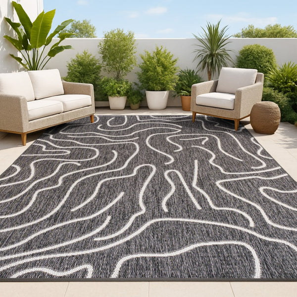 HomeRoots 5' X 8' Black and Cream Abstract Area Rug - Stylish Indoor & Outdoor Modern Accent for Any Space 704688
