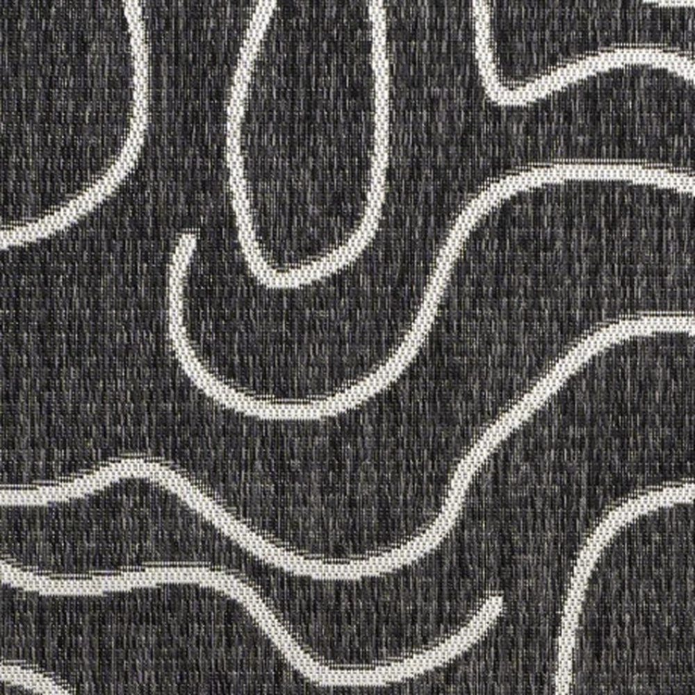 HomeRoots 8' X 10' Stylish Black and Cream Abstract Area Rug – Durable, Versatile, Perfect for Indoor/Outdoor Use! 704689