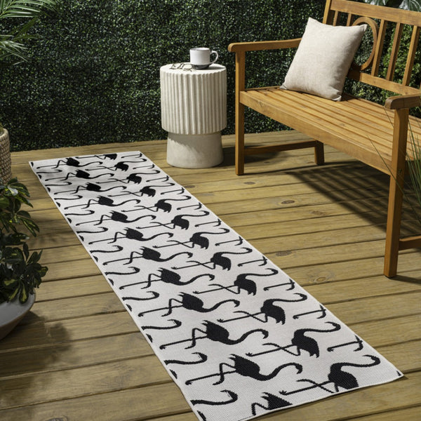 HomeRoots 8' White and Black Animal Print Runner Rug – Durable, Stylish Indoor/Outdoor Accent for Any Space 704715