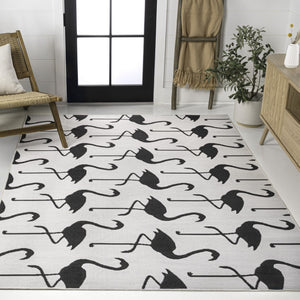 HomeRoots 4' White and Black Animal Print Area Rug - Stylish Indoor/Outdoor Comfort for Any Living Space 704717
