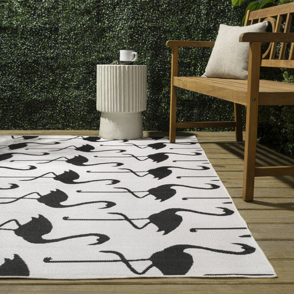 HomeRoots 4' White and Black Animal Print Area Rug - Stylish Indoor/Outdoor Comfort for Any Living Space 704717