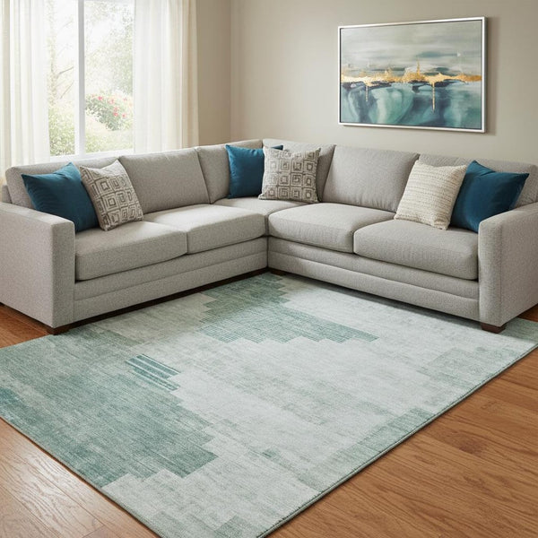 HomeRoots 8' X 10' Teal And Ivory Geometric Washable Area Rug - Stylish Durability with UV Protection! 704949