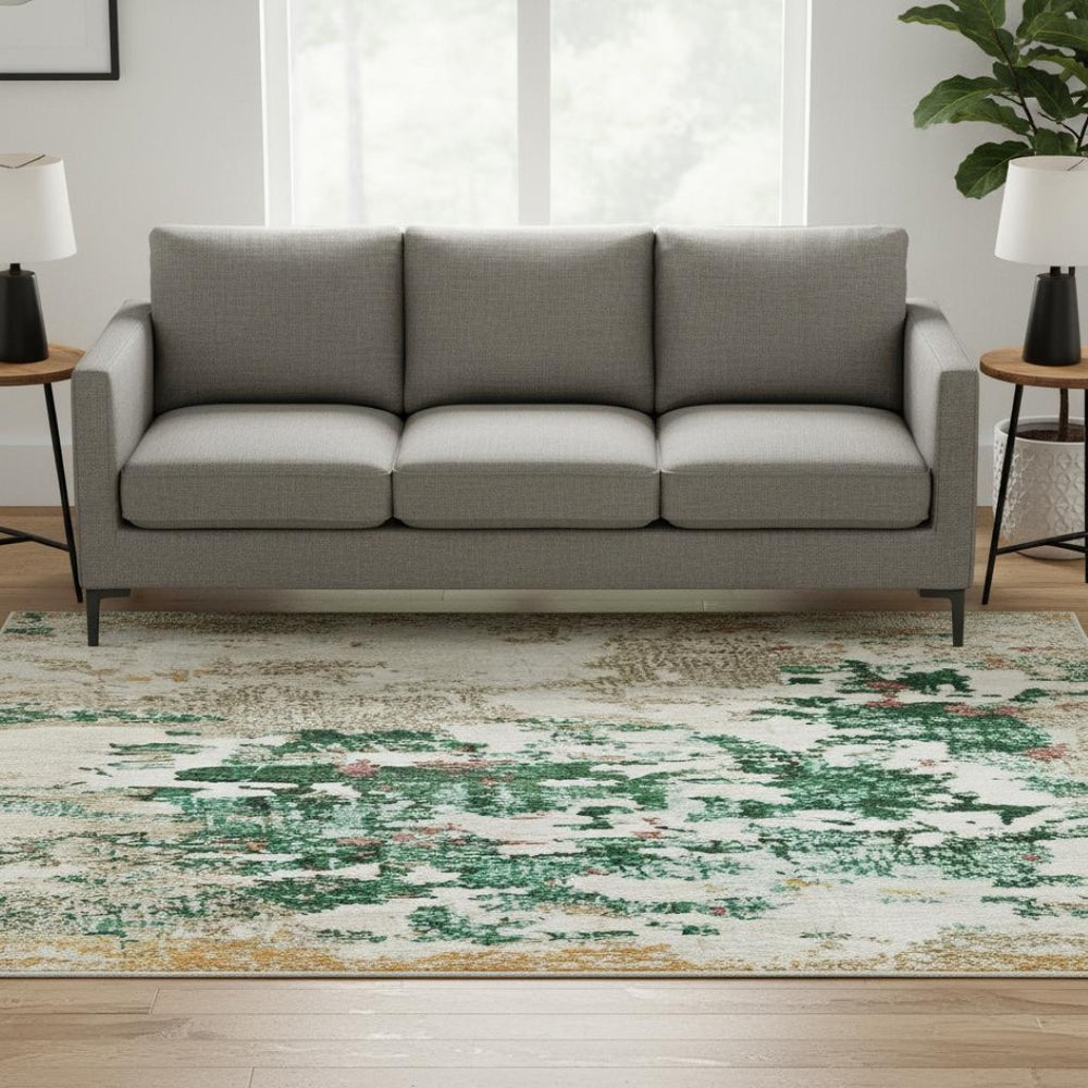 HomeRoots 8' Vibrant Orange, Teal & Blush Abstract Round Rug - Washable, UV-Protected & Stain-Resistant Design 704972
