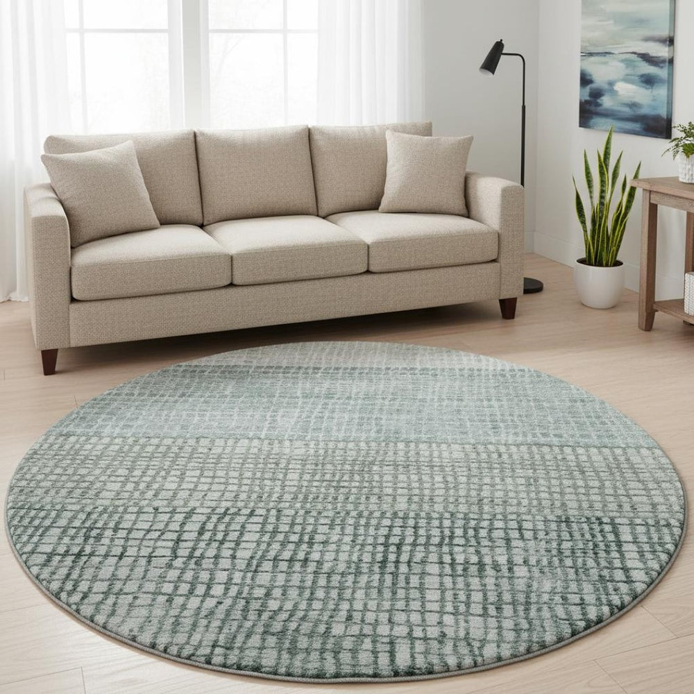 HomeRoots 8' Contemporary Aqua Ivory Gray Geometric Washable Round Rug with UV Protection & Stain Resistance 705002