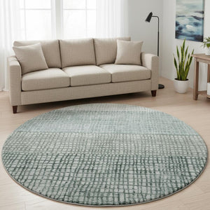 HomeRoots 8' Contemporary Aqua Ivory Gray Geometric Washable Round Rug with UV Protection & Stain Resistance 705002