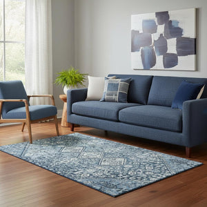 HomeRoots 5' X 8' Blue and Ivory Geometric Area Rug - Washable, UV-Protected, Stain-Resistant, Modern Decor 705145