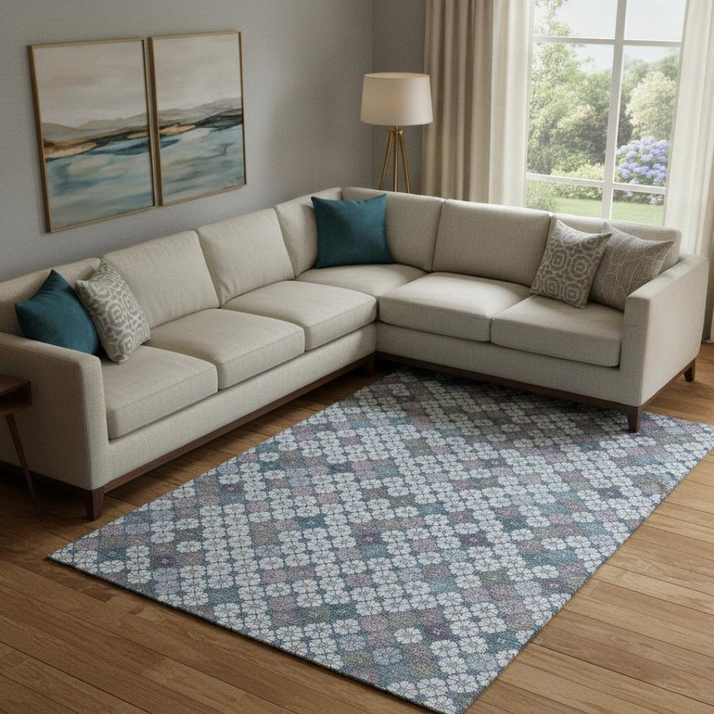 HomeRoots 10' X 14' Modern Geometric Area Rug in Sky Blue, Teal & Lavender – Washable, UV Protected & Durable! 705323