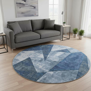 HomeRoots 8' Navy Blue and Ivory Abstract Geometric Round Rug - Washable, UV Protected, Perfect for Any Room 705344