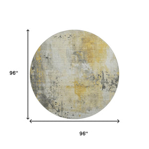 HomeRoots 8' Gold Ivory and Gray Abstract Round Rug - Washable, UV Protected, Durable for High-Traffic Homes 705386