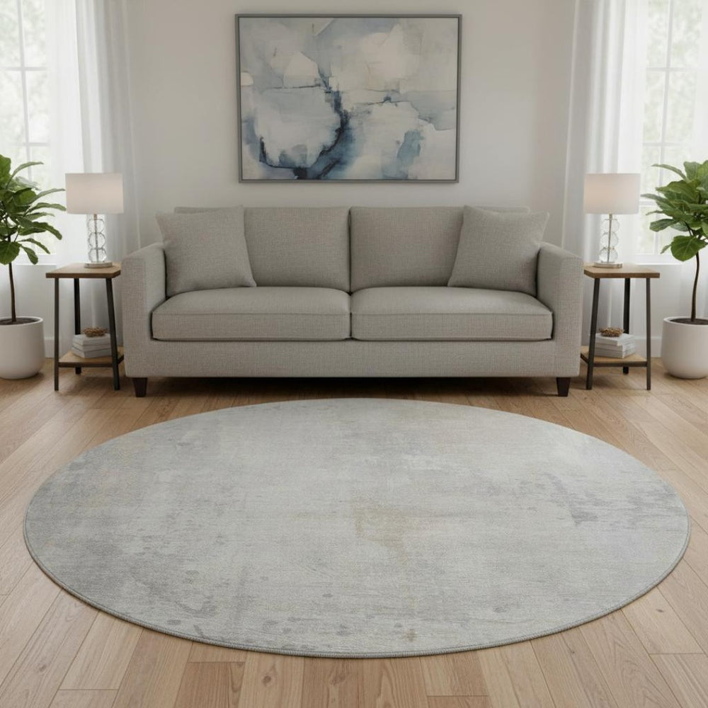 HomeRoots 8' Ivory and Beige Abstract Round Rug – Washable, UV Protected, Durable Design for Modern Spaces 705392