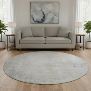 HomeRoots 8' Ivory and Beige Abstract Round Rug – Washable, UV Protected, Durable Design for Modern Spaces 705392