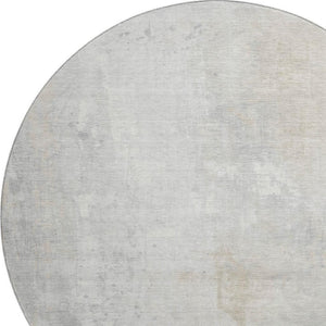 HomeRoots 8' Ivory and Beige Abstract Round Rug – Washable, UV Protected, Durable Design for Modern Spaces 705392