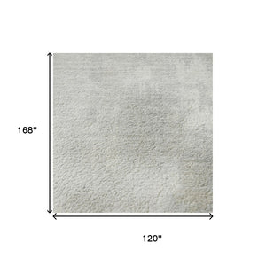 HomeRoots 10' X 14' Ivory & Beige Abstract Area Rug - Washable, UV Protected, Durable, Modern Design for Homes 705395
