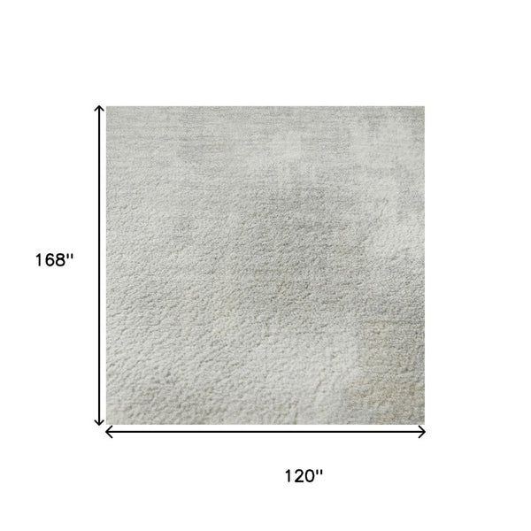 HomeRoots 10' X 14' Ivory & Beige Abstract Area Rug - Washable, UV Protected, Durable, Modern Design for Homes 705395