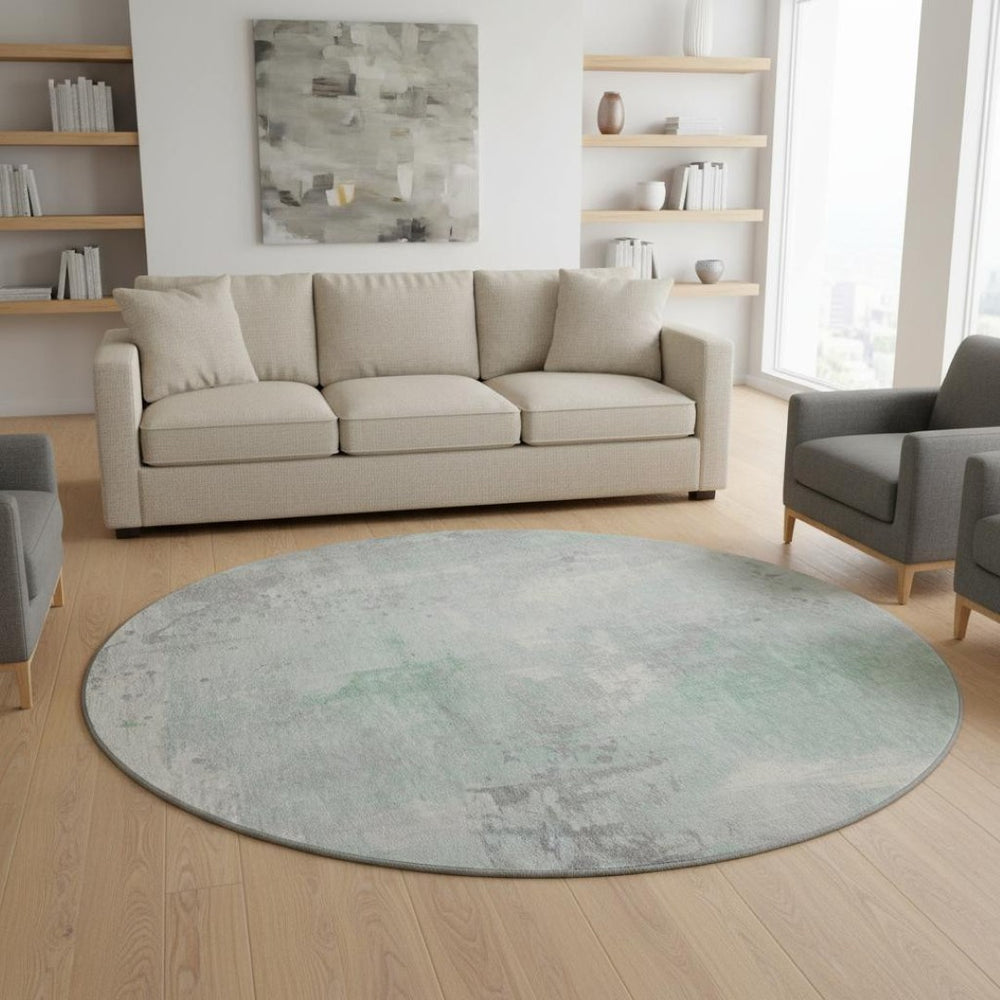 HomeRoots 8' Mint Green and Ivory Abstract Round Rug - Washable, UV-Protected, Stain-Resistant, Durable Design 705398