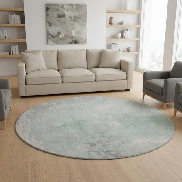 HomeRoots 8' Mint Green and Ivory Abstract Round Rug - Washable, UV-Protected, Stain-Resistant, Durable Design 705398