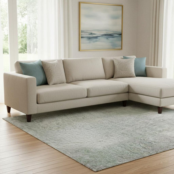 HomeRoots 8' X 10' Mint Green & Ivory Abstract Area Rug – Washable, UV-Protected, Family-Friendly Design! 705399