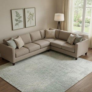 HomeRoots 9' X 12' Mint Green & Ivory Abstract Washable Area Rug - Stain-Resistant, UV-Protected Comfort! 705400
