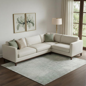 HomeRoots 10' X 14' Mint Green & Ivory Abstract Washable Area Rug - UV Protected, Stain-Resistant & Stylish! 705401