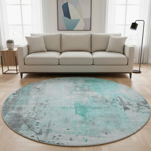 HomeRoots 8' Teal Gray And Ivory Abstract Washable Round Rug - Durable, UV-Resistant, Family-Friendly Design! 705416