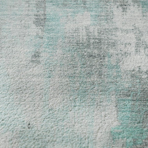 HomeRoots 8' Teal Gray And Ivory Abstract Washable Round Rug - Durable, UV-Resistant, Family-Friendly Design! 705416