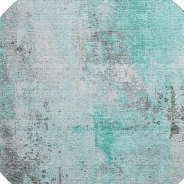 HomeRoots 8' Teal Gray And Ivory Abstract Washable Round Rug - Durable, UV-Resistant, Family-Friendly Design! 705416