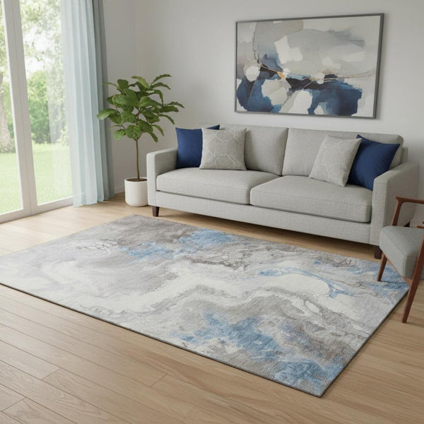 HomeRoots 5' X 8' Abstract Washable Area Rug in Taupe, Blue & Ivory - UV Protected, Stain Resistant, Modern Design 705439