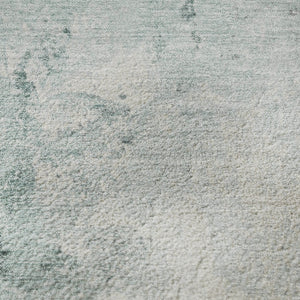 HomeRoots 8' Pale Aqua and Ivory Abstract Round Rug - Washable, UV-Protected, Durable, Ideal for High-Traffic Areas 705482