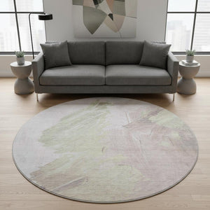 HomeRoots 8' Pink and Ivory Abstract Washable Round Rug - Durable, UV-Protected, Modern Design for Any Space! 705506