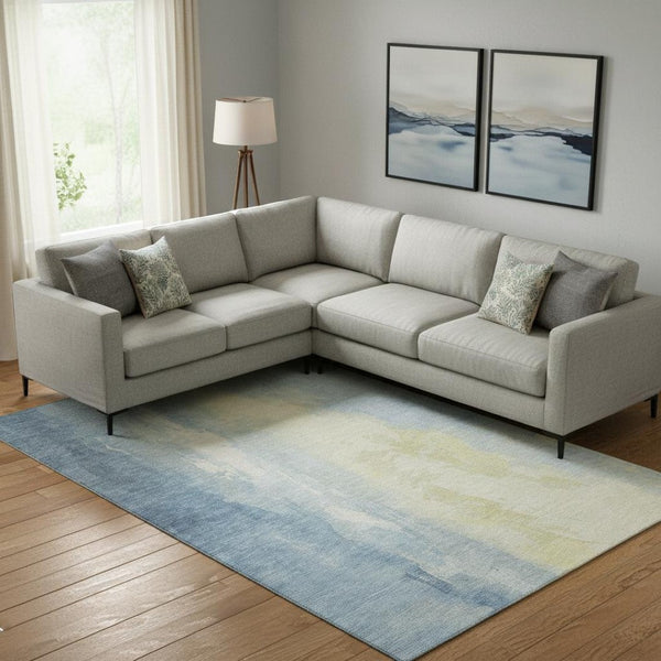 HomeRoots 9' X 12' Denim Blue & Beige Abstract Washable Area Rug with UV Protection for Modern Interiors 705526