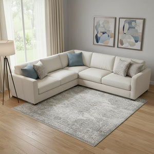 HomeRoots 10' Gray and Ivory Abstract Washable Area Rug - Durable, UV-Protected, Perfect for High-Traffic Spaces 705533
