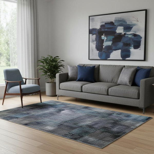 HomeRoots 5' X 8' Vibrant Blue and Gold Abstract Washable Area Rug with UV Protection for Family Spaces 705547