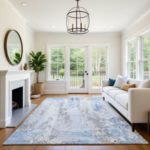 HomeRoots 9' X 12' Sky Blue & Ivory Abstract Area Rug - Durable, Washable, Stain-Resistant with UV Protection 705646