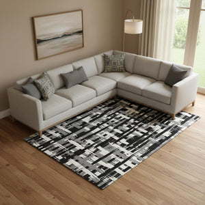 HomeRoots 10' X 14' Black And Ivory Striped Washable Area Rug with UV Protection - Stylish, Durable, and Versatile! 705659