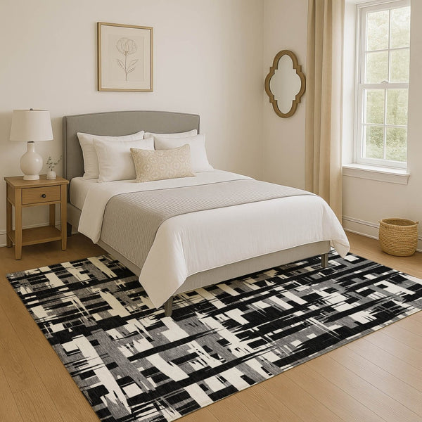 HomeRoots 10' X 14' Black And Ivory Striped Washable Area Rug with UV Protection - Stylish, Durable, and Versatile! 705659
