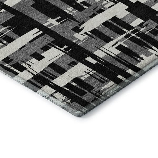 HomeRoots 10' X 14' Black And Ivory Striped Washable Area Rug with UV Protection - Stylish, Durable, and Versatile! 705659