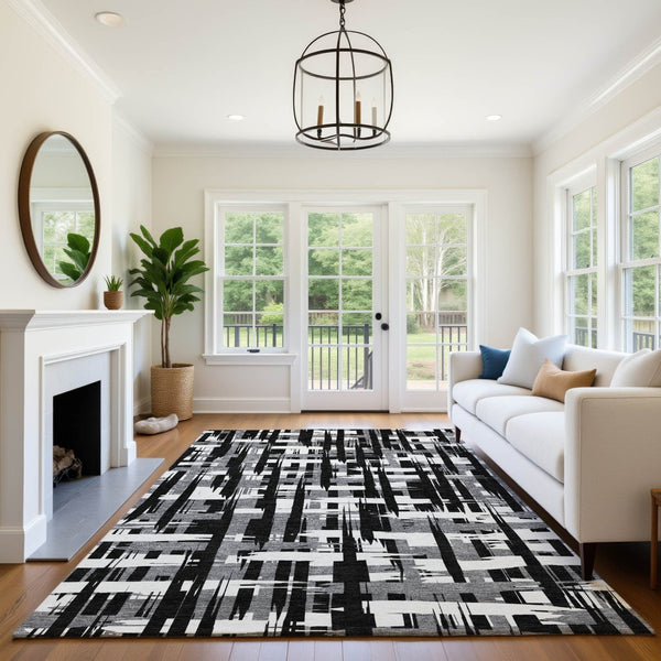 HomeRoots 10' X 14' Black And Ivory Striped Washable Area Rug with UV Protection - Stylish, Durable, and Versatile! 705659