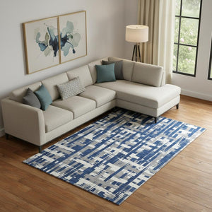 HomeRoots 9' X 12' Striped Navy Blue & Ivory Washable Area Rug with UV Protection for High-Traffic Spaces 705700