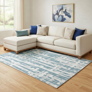 HomeRoots 8' X 10' Striped Teal & Ivory Washable Area Rug - Durable, UV Protected, Perfect for High-Traffic Spaces 705711
