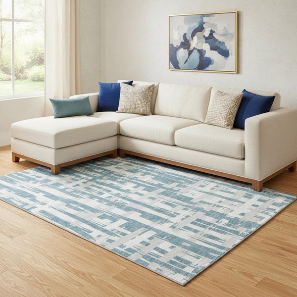 HomeRoots 8' X 10' Striped Teal & Ivory Washable Area Rug - Durable, UV Protected, Perfect for High-Traffic Spaces 705711
