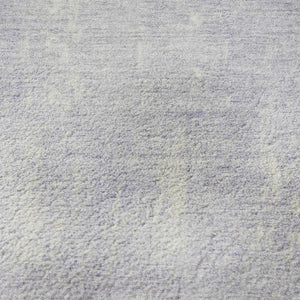 HomeRoots 8' Lavender and Ivory Abstract Round Rug - Kid & Pet Friendly, UV Protected, Easy Care Design 705794