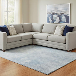 HomeRoots 8' X 10' Sky Blue & Ivory Abstract Washable Area Rug - UV Protected, Stain Resistant, Family Friendly! 705807