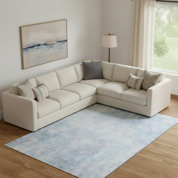 HomeRoots 9' X 12' Sky Blue & Ivory Abstract Area Rug – Washable, UV Protected, Stylish for Any Room Decor! 705808