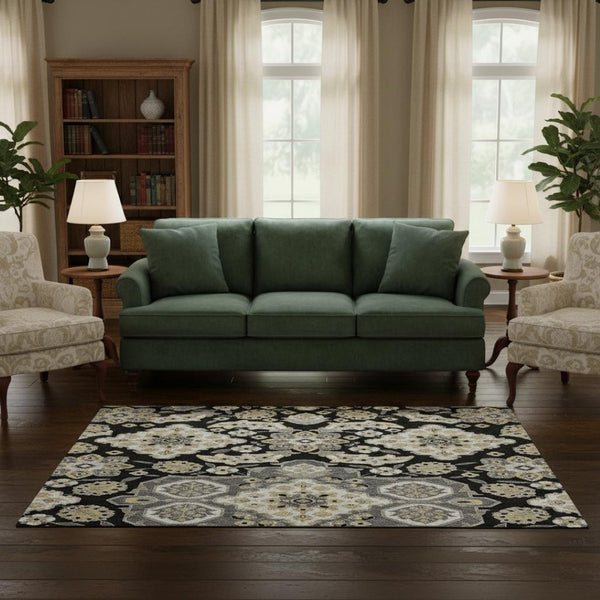 HomeRoots 8' Black and Beige Floral Medallion Round Rug – Washable, UV Protected, Durable for Indoor & Outdoor Use 705818