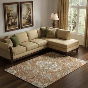 HomeRoots 10' X 14' Washable Terra Cotta Floral Medallion Area Rug with UV Protection for High-Traffic Spaces 705887