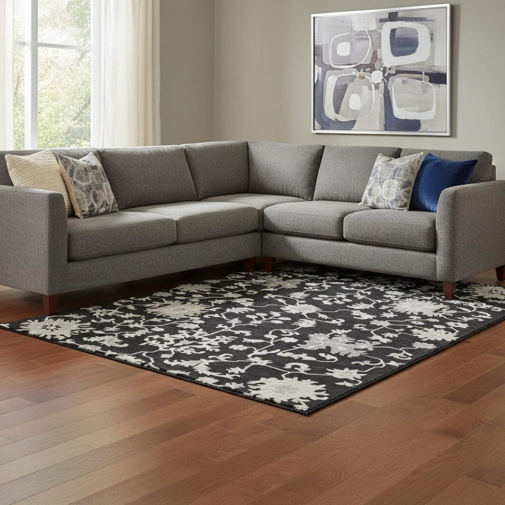 HomeRoots 8' X 10' Black and Ivory Floral Area Rug - Washable, UV Protected, Stylish & Stain Resistant Design 705903
