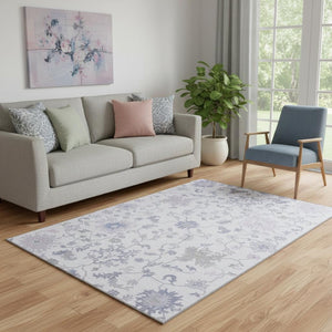 HomeRoots 5' X 8' Floral Area Rug in Lavender & Gray – Washable, UV-Protected, Durable & Family-Friendly Design 705913