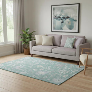 HomeRoots 5' X 8' Pale Aqua & Ivory Floral Area Rug - Washable, UV Protected, Ideal for High-Traffic Spaces! 705919