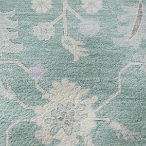 HomeRoots 8' Pale Aqua and Ivory Floral Washable Round Rug with UV Protection - Family-Friendly Home Decor Gem 705920