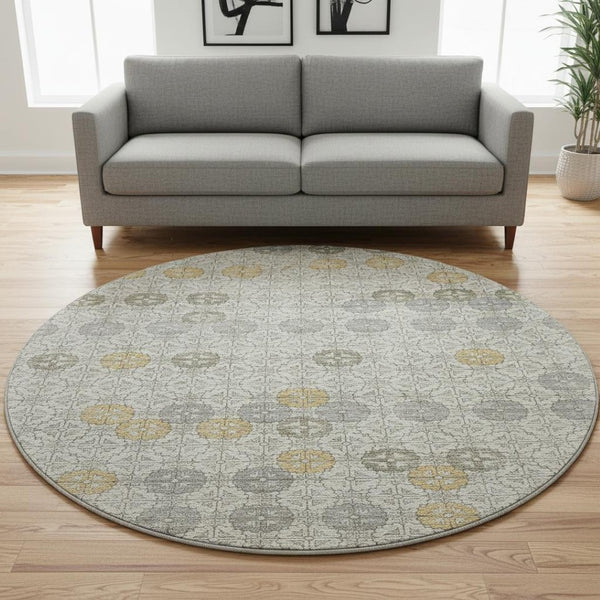 HomeRoots 8' Ivory Gold and Gray Geometric Round Rug - Washable, UV Protected, Elegant Design for Any Space 705944
